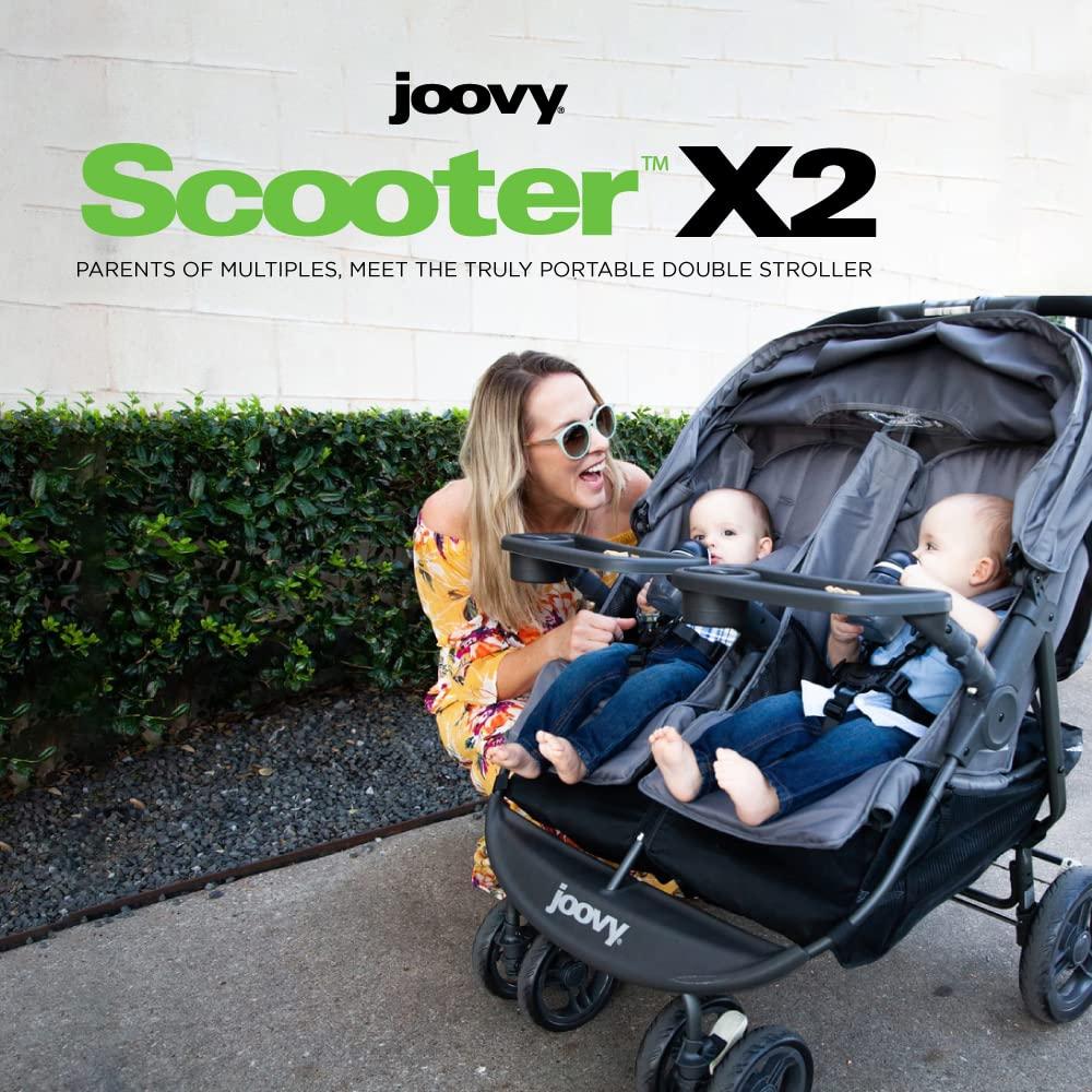imageJoovy Scooter X2 SidebySide Double Stroller Featuring Dual Snack Trays OneHanded Fold MultiPosition Reclining Seats Adjustable Leg Rests and inSeat Storage BlueberryBlueberry