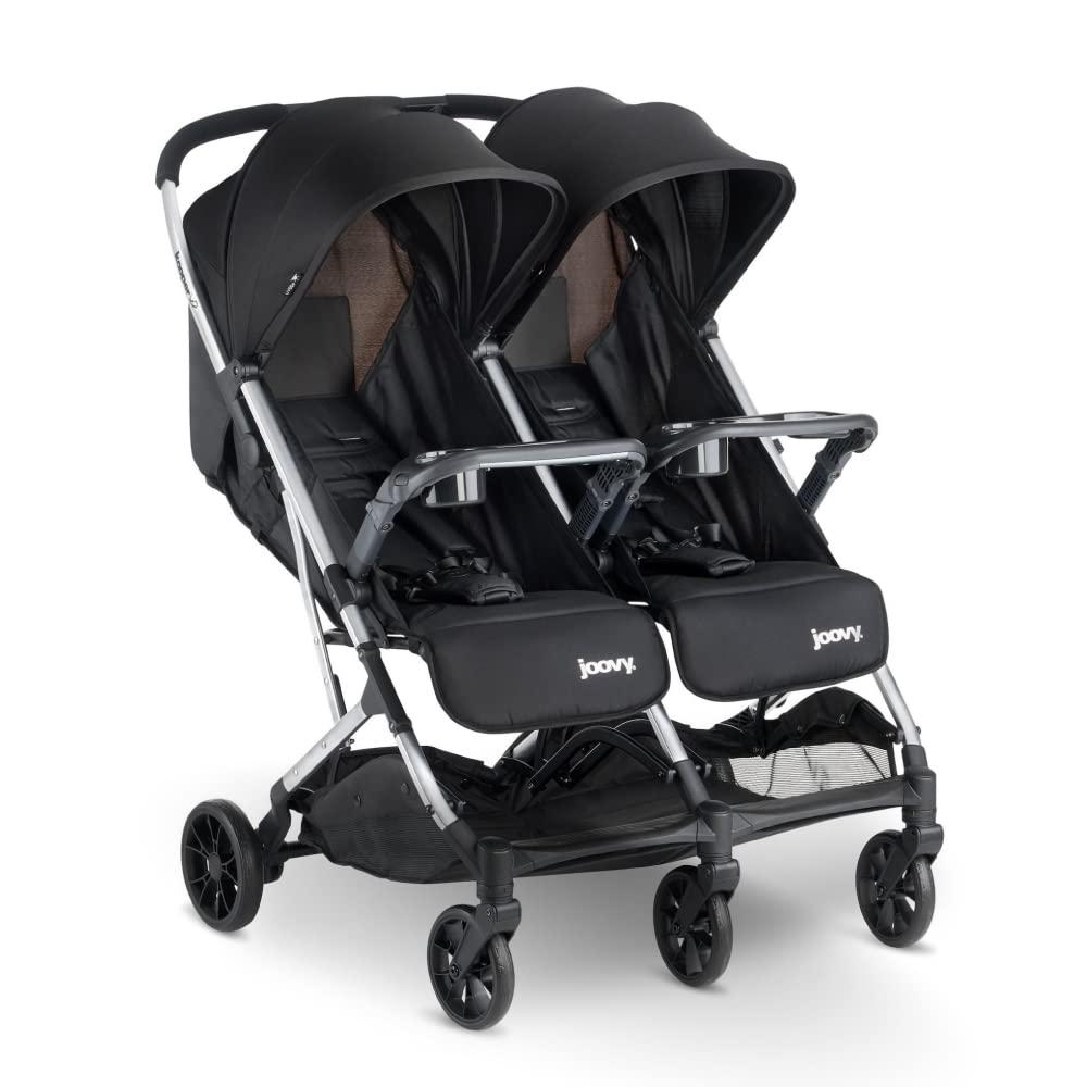 imageJoovy Kooper Lightweight Baby Stroller Featuring Removable SwingOpen Tray Big Wheels Reclining Seat with Footrest ExtraLarge Retractable Canopy and Compact Fold SandBlack