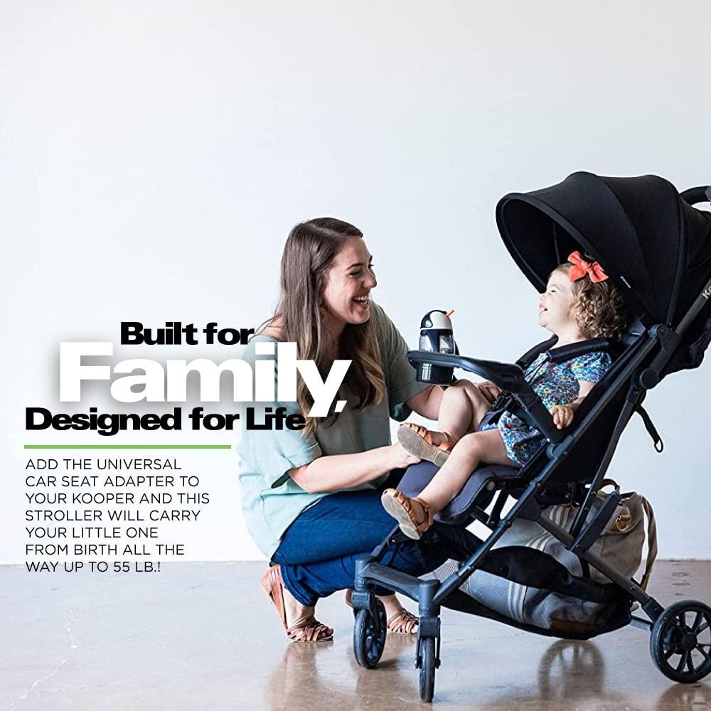 imageJoovy Kooper Lightweight Baby Stroller Featuring Removable SwingOpen Tray Big Wheels Reclining Seat with Footrest ExtraLarge Retractable Canopy and Compact Fold SandForged Iron