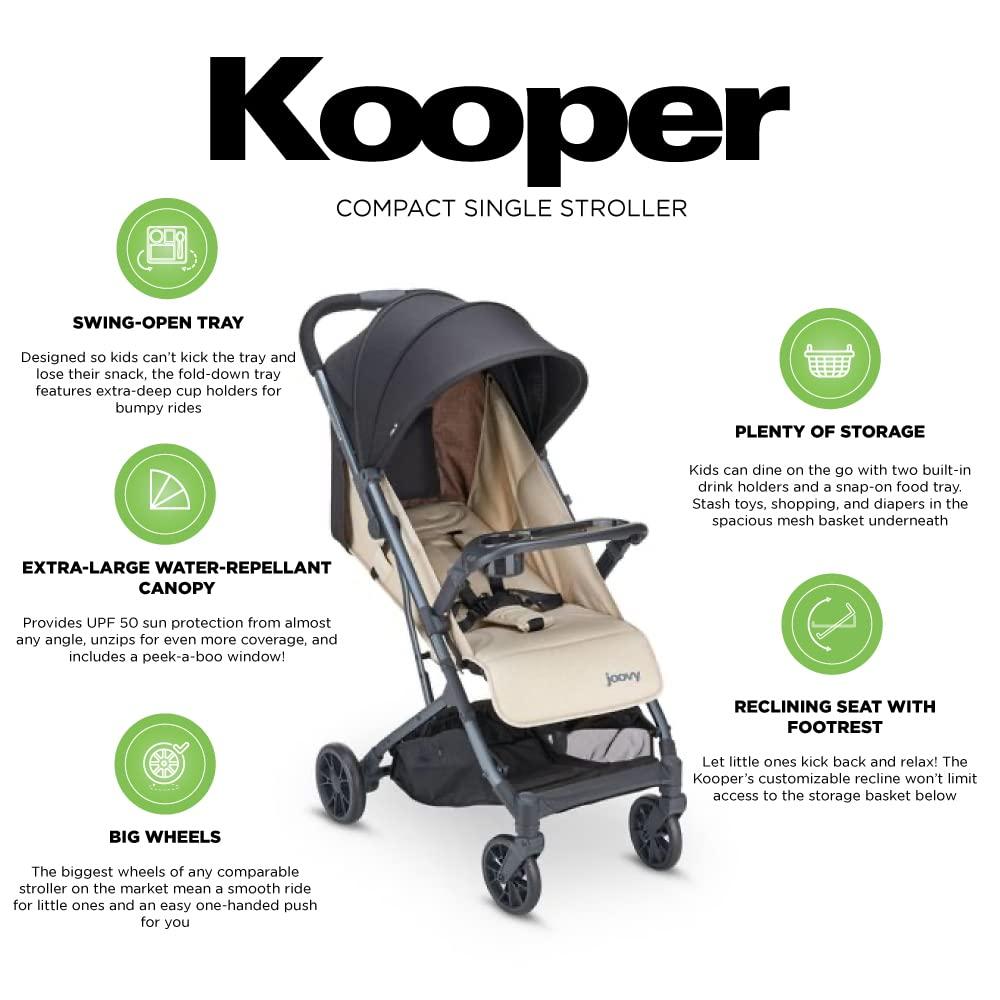 imageJoovy Kooper Lightweight Baby Stroller Featuring Removable SwingOpen Tray Big Wheels Reclining Seat with Footrest ExtraLarge Retractable Canopy and Compact Fold SandSand