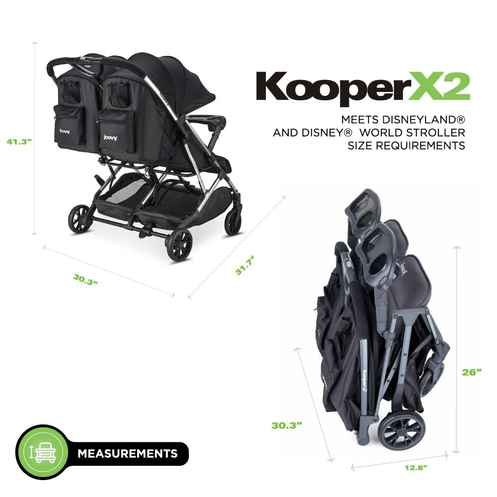 imageJoovy Kooper Lightweight Baby Stroller Featuring Removable SwingOpen Tray Big Wheels Reclining Seat with Footrest ExtraLarge Retractable Canopy and Compact Fold SandBlack