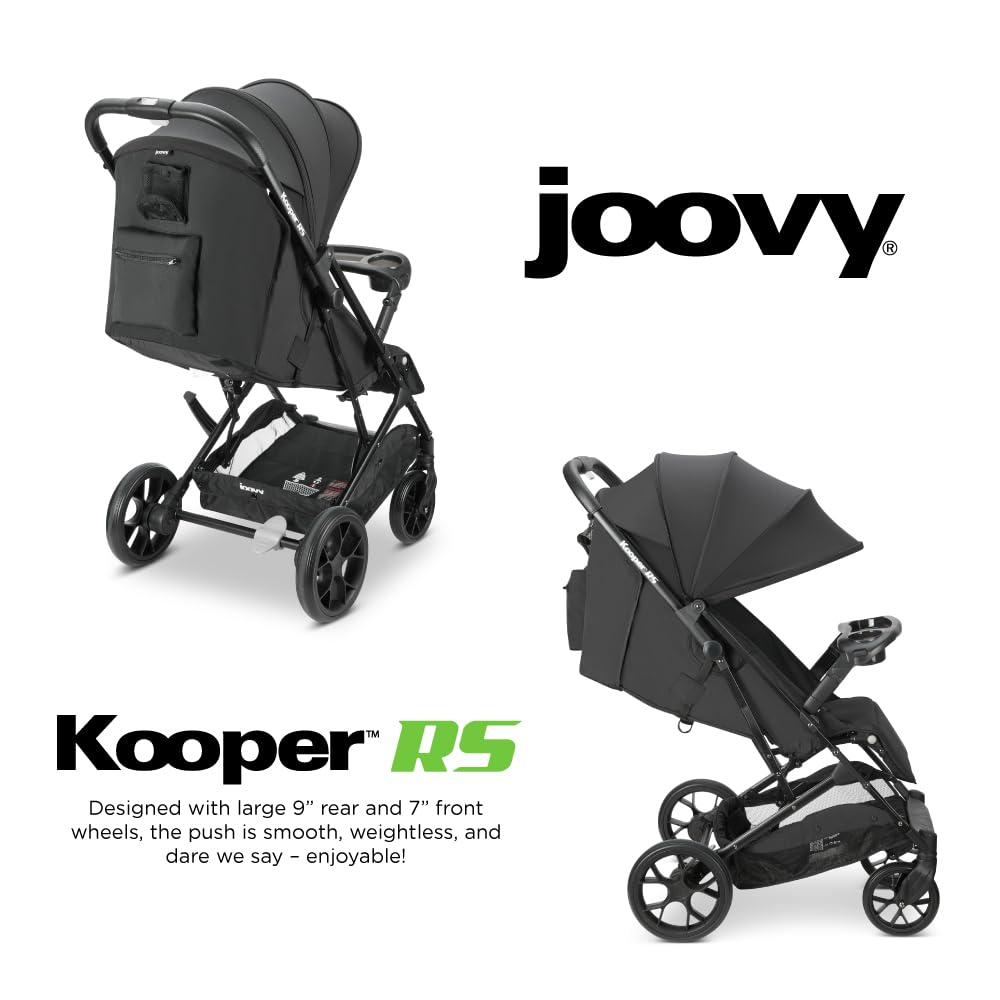 imageJoovy Kooper Lightweight Baby Stroller Featuring Removable SwingOpen Tray Big Wheels Reclining Seat with Footrest ExtraLarge Retractable Canopy and Compact Fold SandBlack