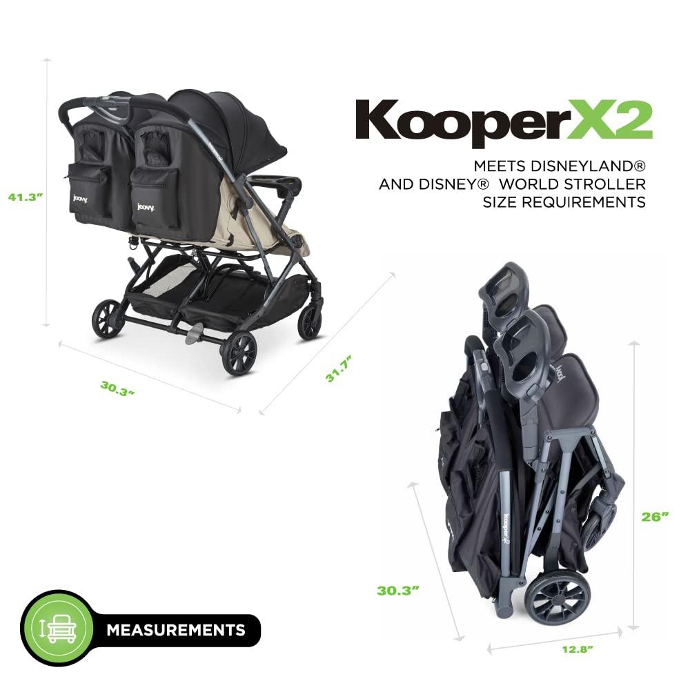 imageJoovy Kooper Lightweight Baby Stroller Featuring Removable SwingOpen Tray Big Wheels Reclining Seat with Footrest ExtraLarge Retractable Canopy and Compact Fold SandSand