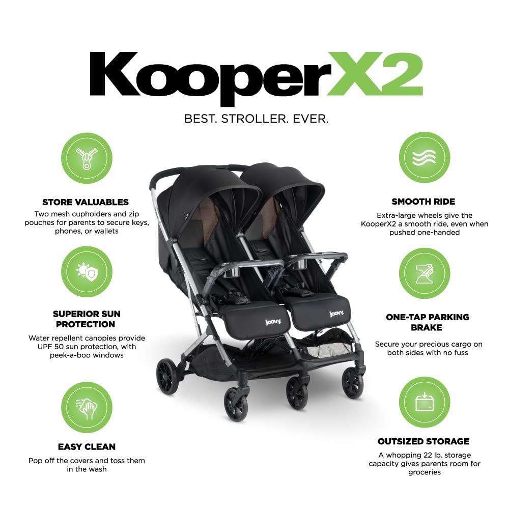 imageJoovy Kooper Lightweight Baby Stroller Featuring Removable SwingOpen Tray Big Wheels Reclining Seat with Footrest ExtraLarge Retractable Canopy and Compact Fold SandBlack