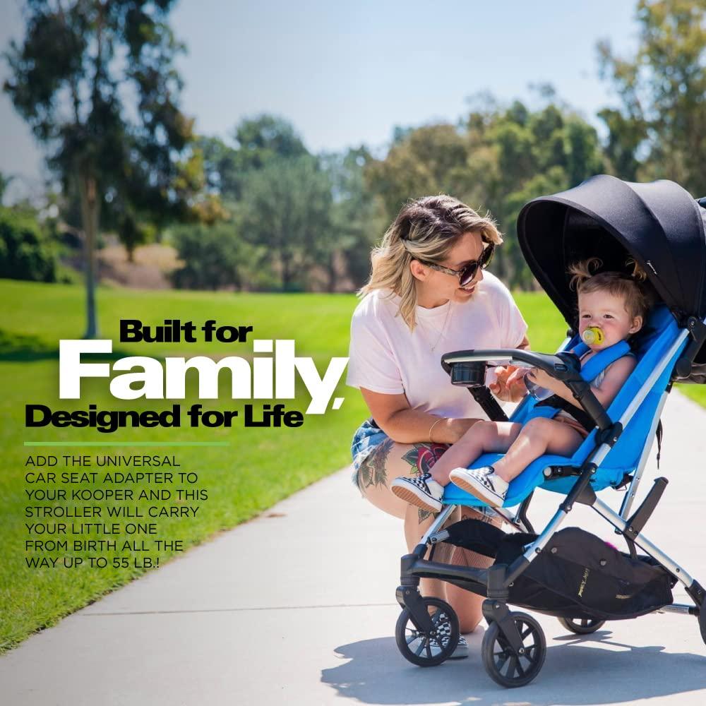 imageJoovy Kooper Lightweight Baby Stroller Featuring Removable SwingOpen Tray Big Wheels Reclining Seat with Footrest ExtraLarge Retractable Canopy and Compact Fold GlacierGlacier